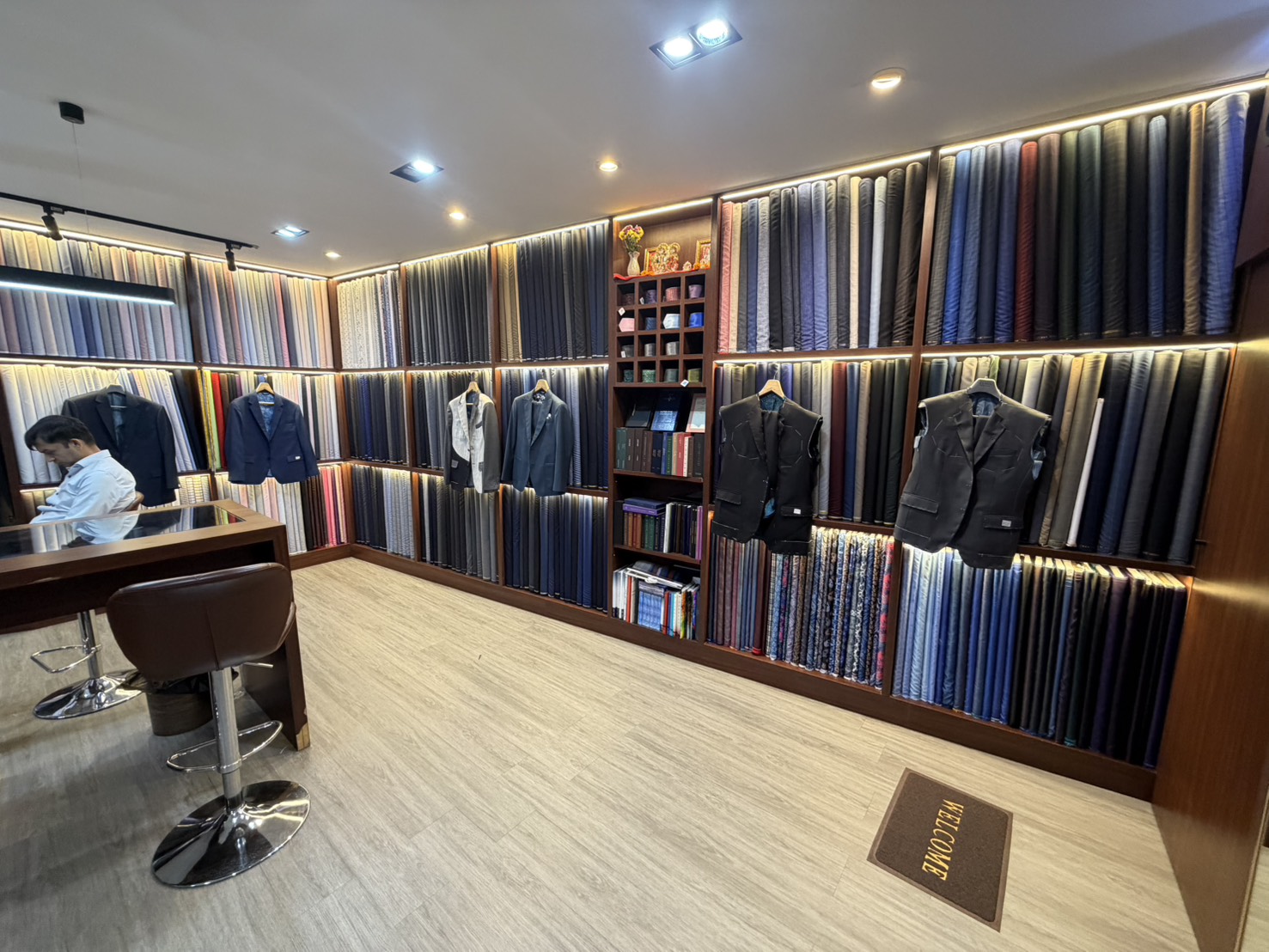Basted bespoke jacket showing internal construction at Class Bespoke Tailor